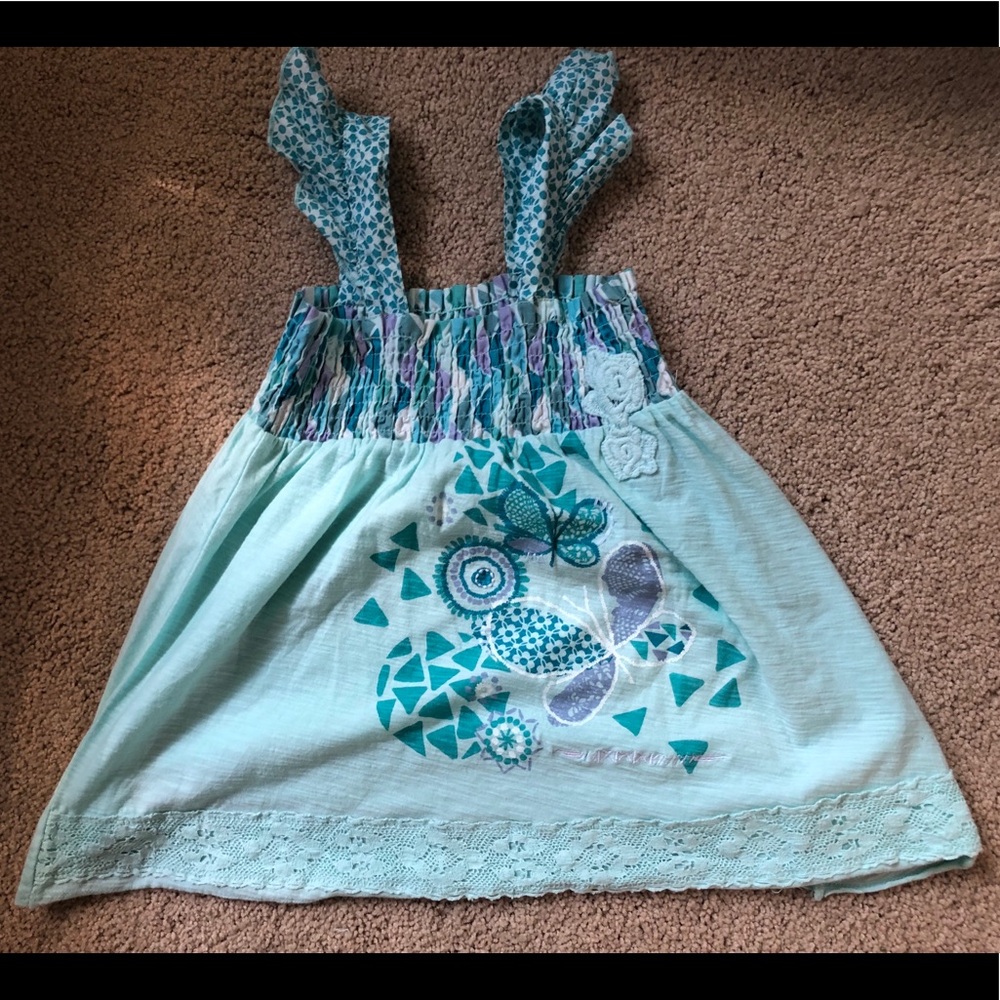 A naartjie kids 6 years girls shirt.